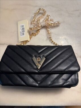 Black Quilted Leather Crossbody Bag with Gold Accent
